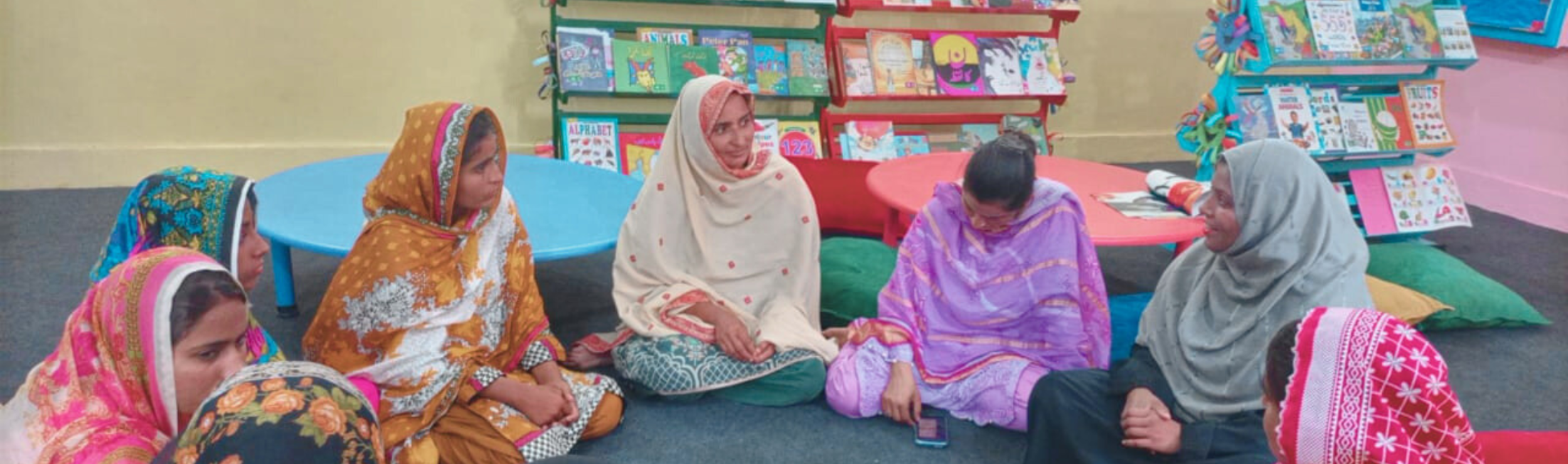 Education in Pakistan, a community gathering at Room to Read library